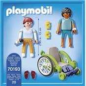 Patient en fauteuil roulant